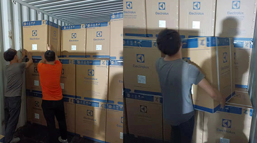 金環電器工作人員齊心協力完成伊萊克斯客戶的干衣機裝柜